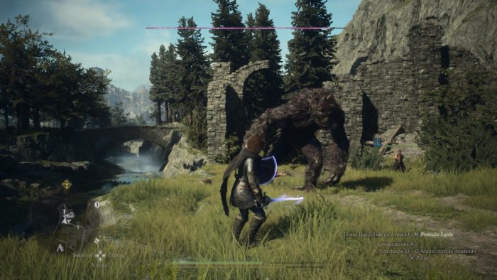 A imagem mostra a Nascen enfrentando um ogro em uma paisagem bonita, com grama e árvores ao fundo em Dragon's Dogma 2.