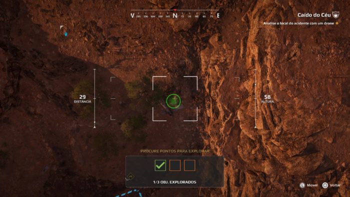 A tela mostra uma varredura aérea do solo arenoso para localizar pontos de interesse.